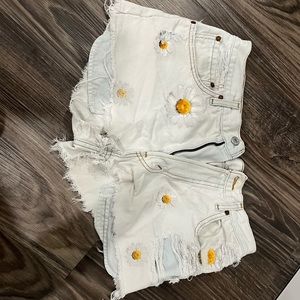 White sunflower jean shorts